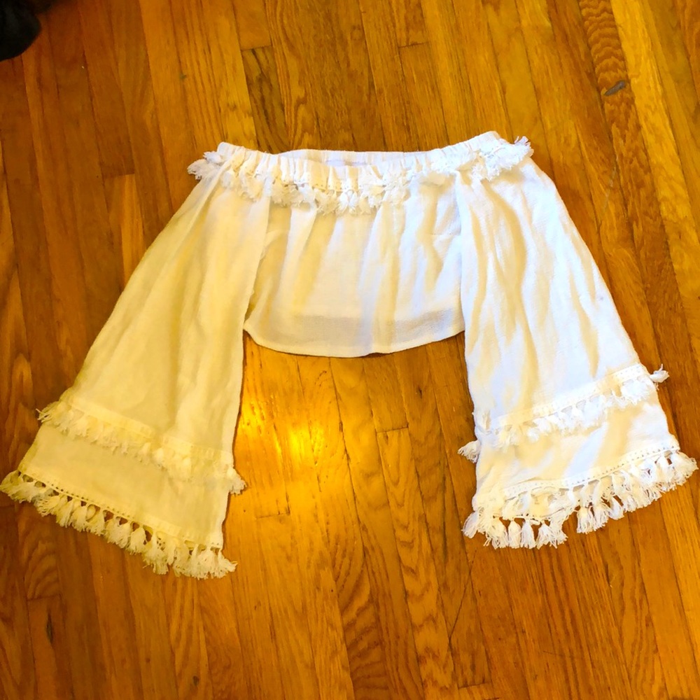 White crop top with bell sleeves and fringe